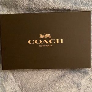 Coach passport holder